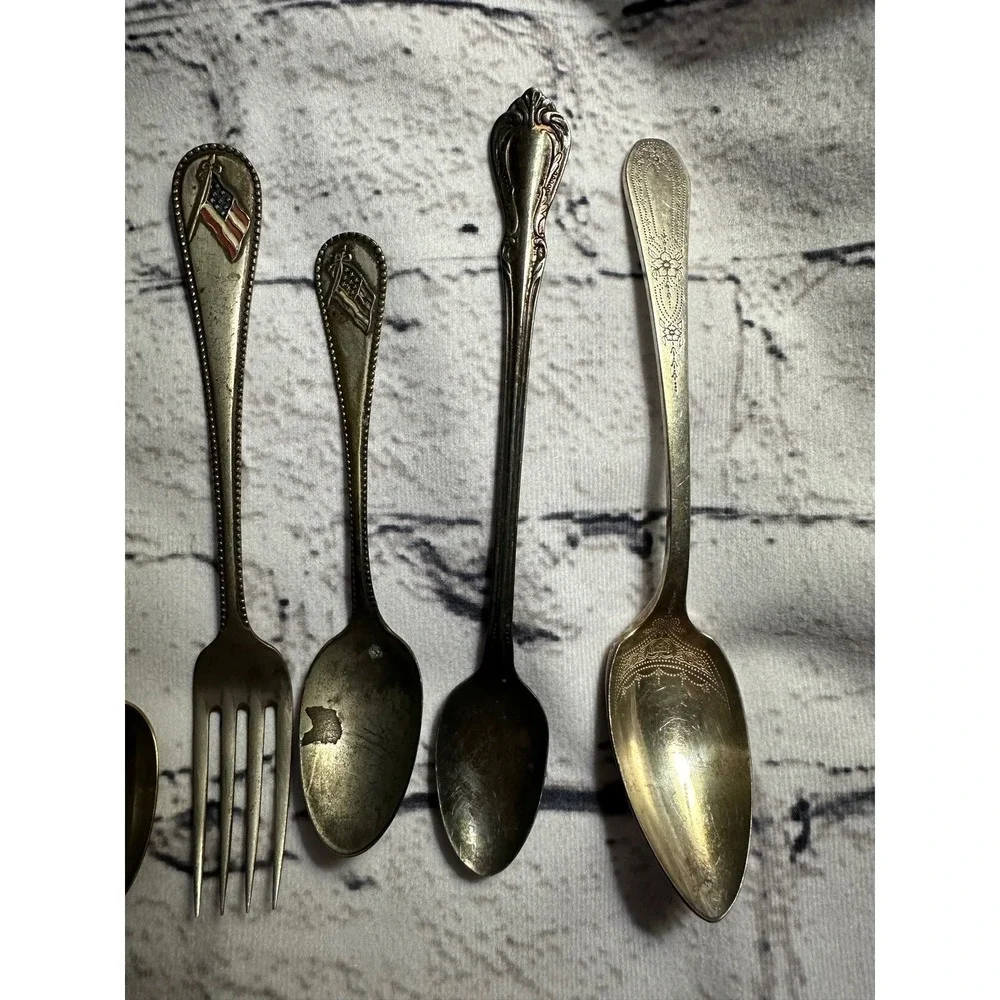 Vintage baby spoons and‎ fork silver?